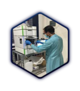 INVILAB researcher operating chromatography equipment
